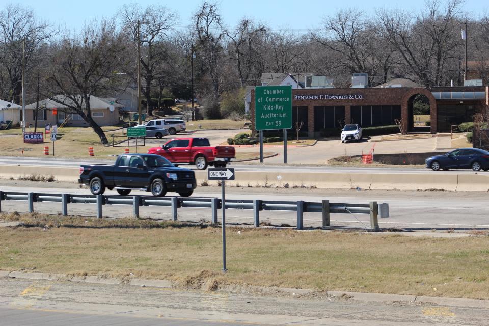 Cars pass along US Highway 75 in Sherman on Feb. 14, 2022.