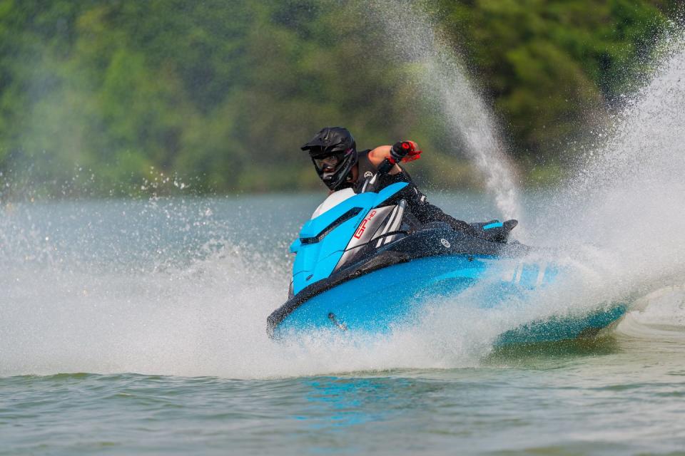 a person riding a waverunner