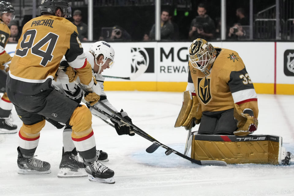 Vegas Golden Knights goaltender Adin Hill (33) blocks a shot by Los Angeles Kings center Blake Lizotte during the first period of an NHL hockey game Wednesday, Nov. 8, 2023, in Las Vegas. (AP Photo/John Locher)