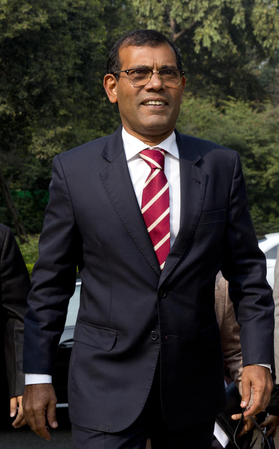 Former Maldives President Mohamed Nasheed arrives to deliver a lecture on climate change in New Delhi, India, Thursday, Feb. 14, 2019. In an interview to The Associated Press Thursday after giving a climate change lecture, Nasheed said the Indian Ocean archipelago nation is seeking tenders for renewable energy projects to help lessen the burden of foreign debt. (AP Photo/Manish Swarup)