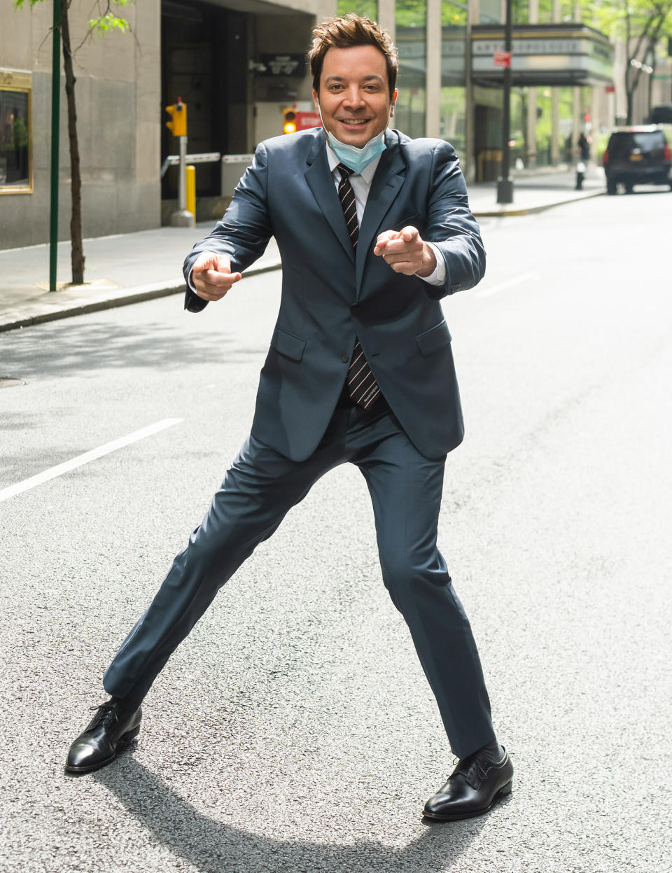 <p>En route to the NBC Upfronts, Jimmy Fallon stops traffic in N.Y.C. on May 16. </p>