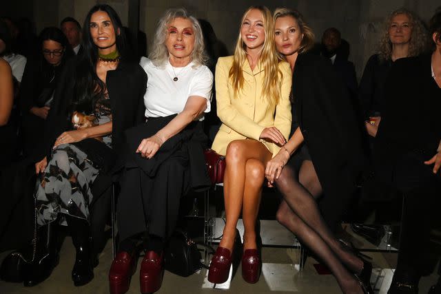 <p>Eamonn M. McCormack/Getty</p> Demi Moore with dog Pilaf, Debbie Harry, Lila and Kate Moss attend the Gucci Cruise 2025 Fashion Show in London on May 13, 2024.