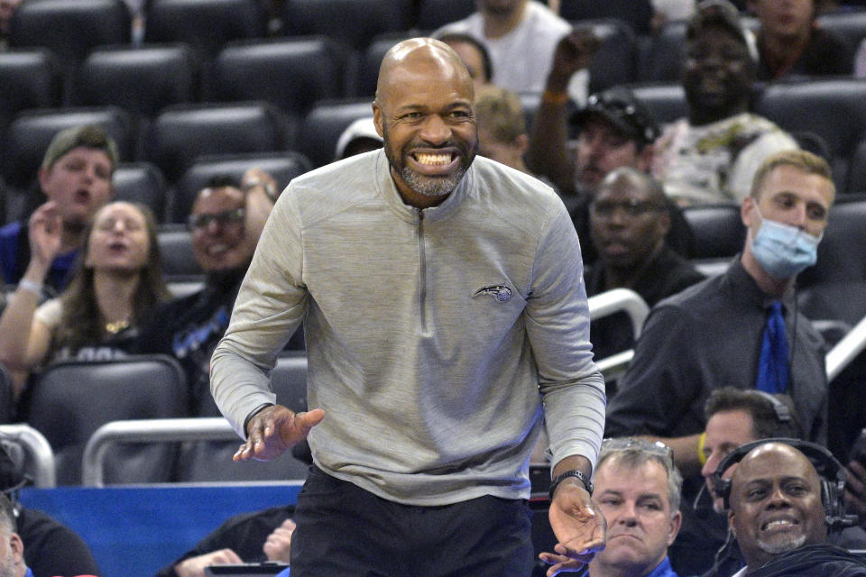 Orlando Magic head coach Jamahl Mosley reacts to a missed shot during the first half of an NBA basketball game against the Oklahoma City Thunder, Sunday, March 20, 2022, in Orlando, Fla. (AP Photo/Phelan M. Ebenhack)