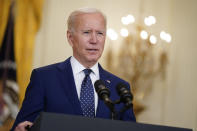 FILE - In this April 15, 2021, file photo, President Joe Biden speaks in the East Room of the White House in Washington. No nation offers asylum or other protections to people displaced because of climate change. Biden’s administration is studying the idea, and climate migration is expected to be discussed at his first climate summit. (AP Photo/Andrew Harnik, File)