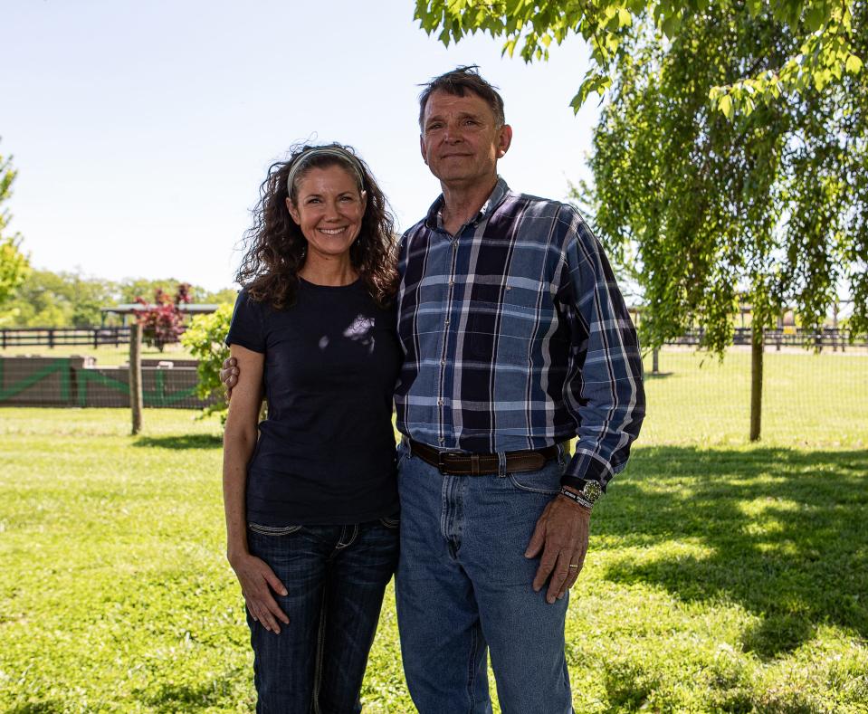 Republican candidate Ed Gallrein and his wife, Heather, pose for a photo on the Gallrein farm in Shelbyville, Ky. Ed Gallrein is running against Aaron Reed and incumbent Adrienne Southworth in the May 21 Kentucky primary election. May 5, 2024