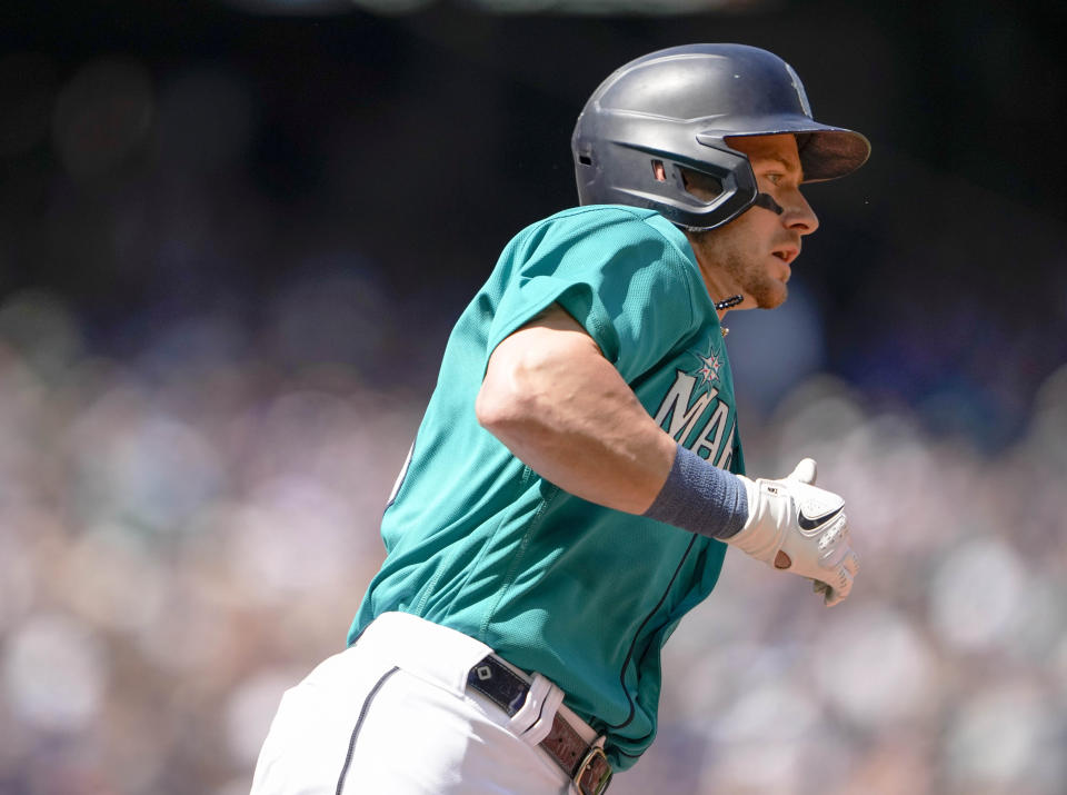 Seattle Mariners left fielder Jarred Kelenic runs out a double against the Pittsburgh Pirates during the fifth inning of a baseball game Saturday, May 27, 2023, in Seattle. (AP Photo/Lindsey Wasson)