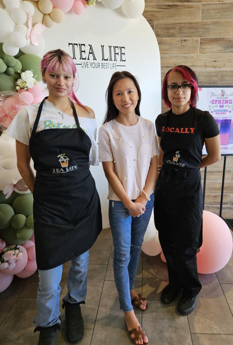 From left, Nellie, shop owner Maya and Sam, three expert baristas in the world of enhanced Thai and Milk teas at Tea Life in Victorville.