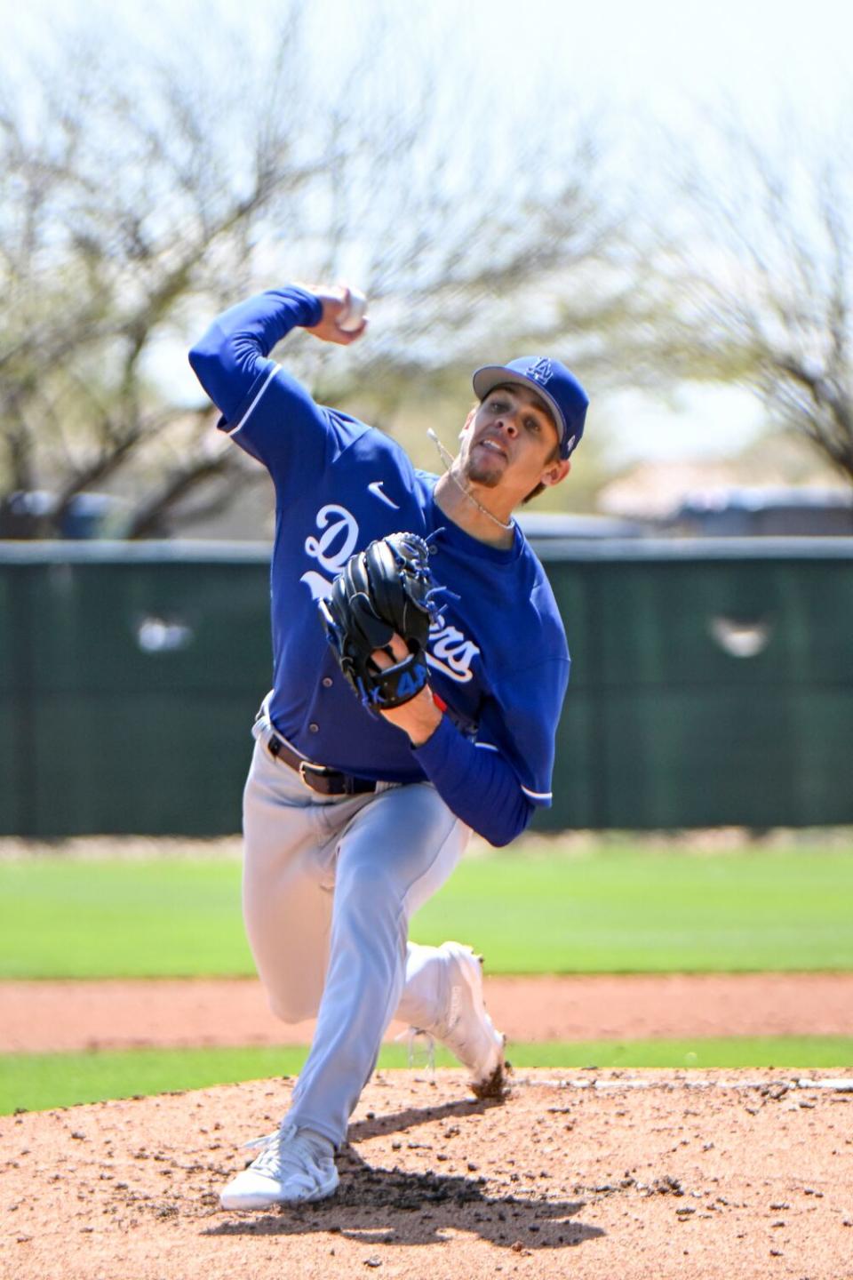 Gavin Stone pulls back to throw the ball from the mound during the Dodgers' spring training