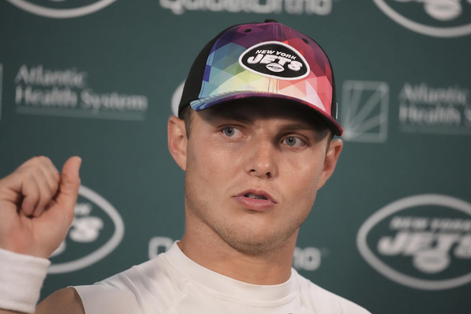 New York Jets quarterback Zach Wilson responds to a question during a news conference after an NFL football game against the Denver Broncos, Sunday, Oct. 8, 2023, in Denver. (AP Photo/David Zalubowski)