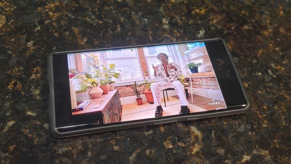 Tidal content showing video on a smartphone