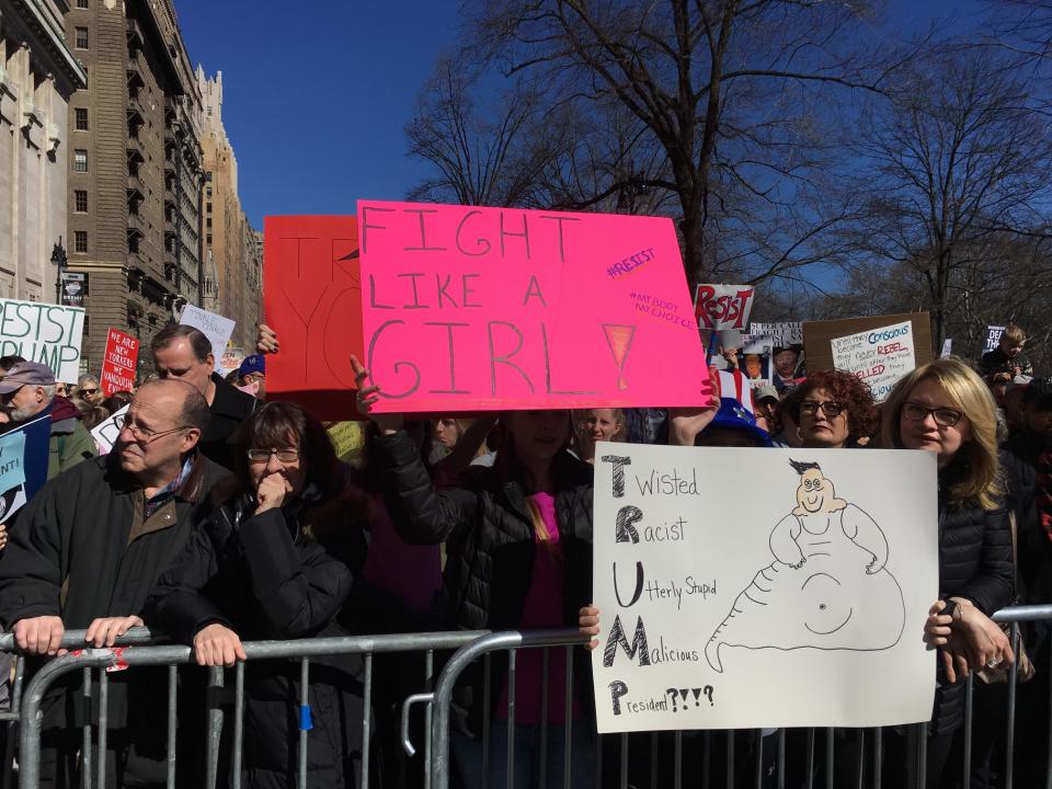 <p>Demonstrators hold up signs during the “Not My President’s Day” rally at Central Park West in New York City on Feb. 20, 2017. (Gordon Donovan/Yahoo News) </p>