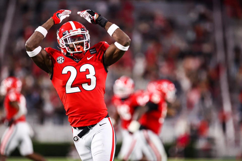 Georgia DB Mark Webb celebrates after making a play against Auburn. (Photo by Tony Walsh/Collegiate Images/Getty Images)