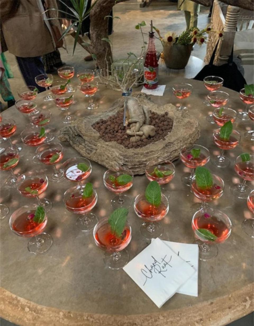 PHOTO: Muslim visual artist Aadil Abedi's gathers friend for Chand Raat event, celebrating the eve of Eid, with red 'Rooh Afza' drinks featuring watermelon radish, symbolic of the Palestinian cause.  (ABC News)