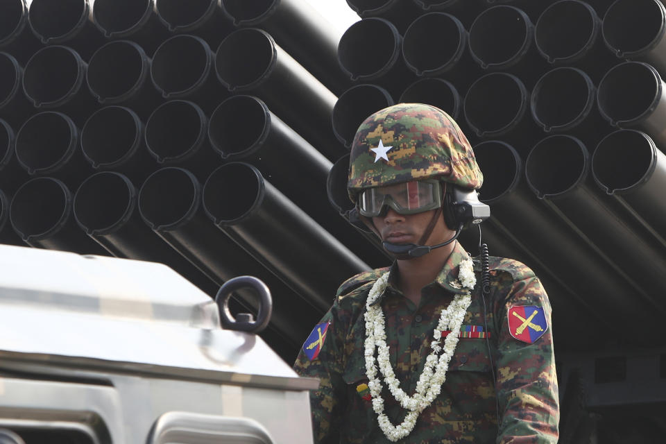 Myanmar's military officer stands atop a truck loaded with missiles during a parade to commemorate Myanmar's 78th Armed Forces Day in Naypyitaw, Myanmar, Monday, March 27, 2023. (AP Photo/Aung Shine Oo)