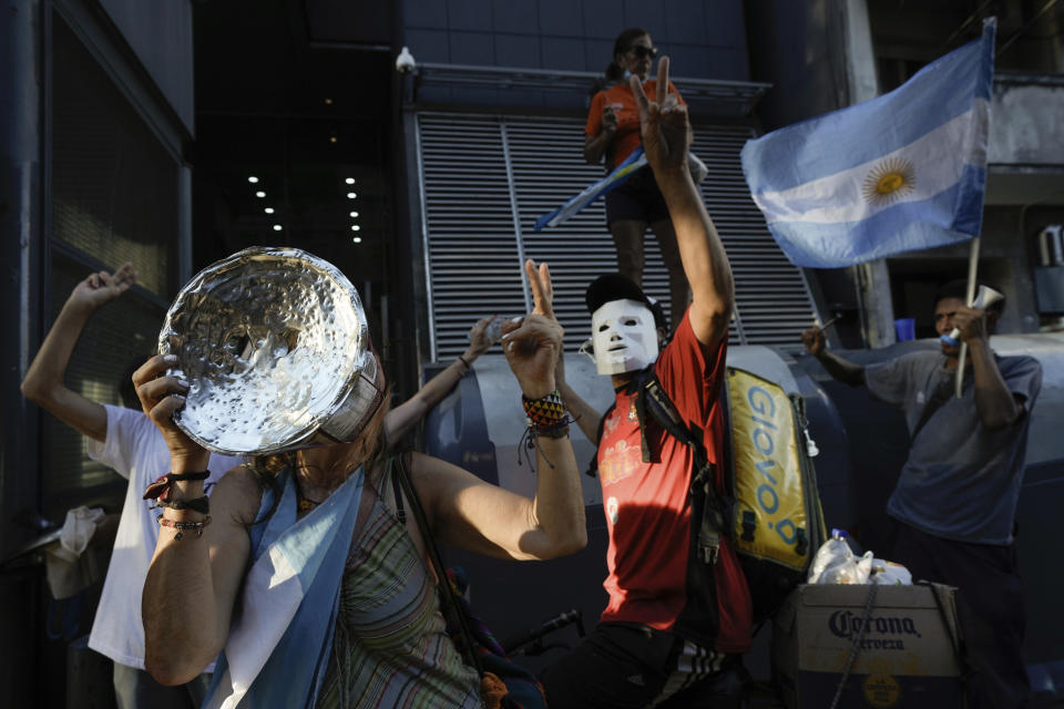 Anti-government protester rally outside Congress after a bill promoted by Argentine President Javier Milei was approved in general by the lower house of Congress, in Buenos Aires, Argentina, Friday, Feb. 2, 2024. The bill, that includes a broad range of economic, administrative, criminal and environmental reforms, must now be debated article by article and will then be sent to the Senate. (AP Photo/Rodrigo Abd)