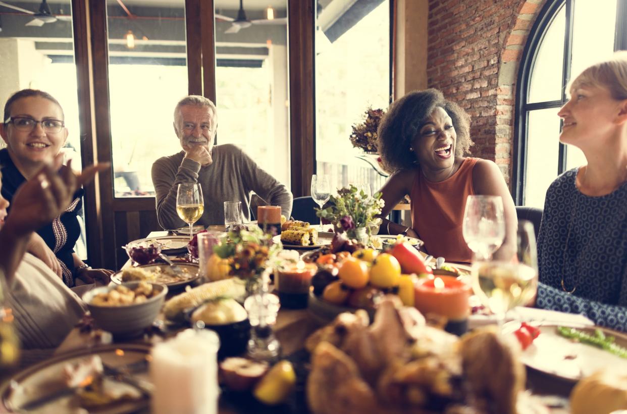 People gathered around a holiday table.