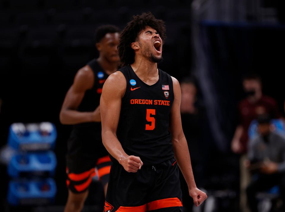 Ethan Thompson of the Oregon State Beavers celebrates against the Loyola-Chicago Ramblers during the first half in the Sweet Sixteen round of the 2021 NCAA Men's Basketball Tournament at Bankers Life Fieldhouse on March 27, 2021 in Indianapolis, Indiana.