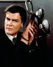 <p>Moore honed his secret-agent chops as Simon Templar in this classic British TV series, playing a charming, roguish antihero who robs from the rich…and keeps the spoils for himself. Moore made a voice-only cameo in the 1997 film version starring Val Kilmer. (Photo: Everett Collection) </p>