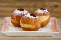 <p>One of the most popular dishes are homemade donuts called sufganiyot. Traditionally they're filled with jelly, though some creative recipes add chocolate or caramel.<br><br>Get the <a href="https://www.goodhousekeeping.com/food-recipes/a48180/classic-jelly-donuts-recipe/" rel="nofollow noopener" target="_blank" data-ylk="slk:Sufganiyot (Jelly Donuts) recipe;elm:context_link;itc:0;sec:content-canvas" class="link "><strong>Sufganiyot (Jelly Donuts)</strong> <strong>recipe</strong></a>.</p><p><strong>RELATED: </strong><a href="https://www.goodhousekeeping.com/holidays/g34311639/hanukkah-desserts/" rel="nofollow noopener" target="_blank" data-ylk="slk:15 Festive and Delicious Hanukkah Desserts;elm:context_link;itc:0;sec:content-canvas" class="link ">15 Festive and Delicious Hanukkah Desserts</a></p>