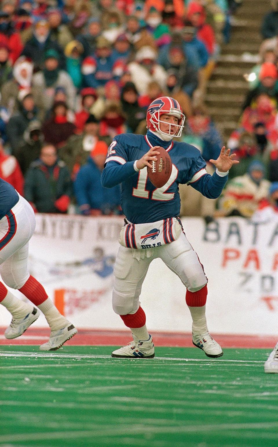 Jim Kelly guided the Bills to a playoff victory at Rich Stadium in the coldest game in team history.