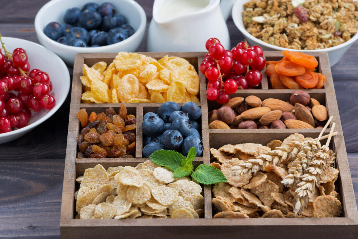 Snacking can help you keep your diet on track, as long as you choose the right foods. [Photo: Getty]