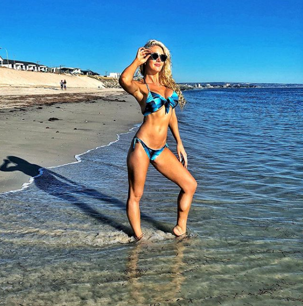 <p>The reality star shows off her incredible body while posing in a bikini on the beach. Instagram/alioetjen </p>