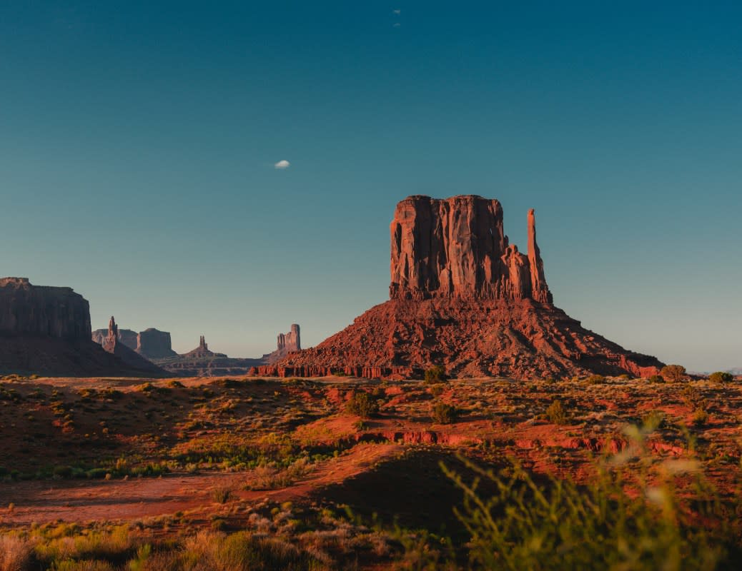 <p>Courtesy of Unsplash | Photo by Gautier Salles</p><p>Guys. I've been hearing for years about the scene in an old mining town in Northeast Arizona. A friend of mine from my Silverlake Wine days has been making wine out here since 2004, and has been inviting me to check it out for about the last decade—I'm real mad at myself for it taking this long. </p><p>When you hear the words "wine" and "Arizona" together, I am sure you feel some kinda way. Especially if you haven't experienced it for yourself. </p><p>It's so hot there. It's a desert. What grapes could possibly do well there?</p><p>Good points. Good question. </p><p>But we are focusing on the wrong sides of the coin.</p><p>Arizona is shaped like a giant bowl, with high elevation topography on the outer parts of the state and lower elevation plains in the middle. If you think of Phoenix as the archetype, you'd be right in the skepticism. But the true wine regions are on the outer rungs of the bowl-like shape of the state. Elevation is your friend.</p><p>I'm in the Northeast, equidistant between Sedona and Prescott. The towns and vineyards range between 3,800ft - 4,900ft elevation. This is key because the warm days are balanced by cold nights, with a large diurnal shift. Always clue in when you hear "diurnal shift"—it's a reference to the difference between the high and low temperature of a day, and the larger the difference, the better for grape growing in warm climates. </p><p>So in this area—the Verde Valley—you're dealing with the cities of Jerome, Cottonwood, Clarkdale, and Cornville. Jerome is an old mining town, dating back to 1876 when large copper deposits were discovered and produced an average of 3 million pounds of copper per month for a prolonged period. As the mines produced less, the population spread down to the lower elevation areas into the early 1910s and established the surrounding cities. </p><p>Prohibition hit the vineyards in the area hard, most were ripped out or went dormant. It took a very long time for the energy of Arizona grape growing to find a champion again...enter Maynard James Keenan. I know him as James—but you probably know him as Maynard—the lead singer in Tool, A Perfect Circle, and Puscifer. He's a legend in the music world, but I argue he's done even more for Arizona wine. </p><p>With 110 acres under vine, 4 winery locations, 4 tasting rooms, 2 restaurants (and more coming?), and 1 record store/barber shop...the footprint of MJK's passion is ever growing and raising the bar for what you can expect from Arizona. Time to redefine what Arizona <strong>IS.</strong> </p><p>He wants you to be excited to taste Arizona wine. </p><p>I've been luckily tasting the fruits of his labor since 2009, and it took me 15 years to get here. Do not wait 15 years, yourself.</p><p>Visit <a href="https://caduceus.org/" rel="nofollow noopener" target="_blank" data-ylk="slk:Caduceus Cellars;elm:context_link;itc:0;sec:content-canvas" class="link ">Caduceus Cellars</a> </p><p>Visit <a href="https://merkintrattoria.com/" rel="nofollow noopener" target="_blank" data-ylk="slk:Merkin Vineyards Hilltop Winery & Trattoria;elm:context_link;itc:0;sec:content-canvas" class="link ">Merkin Vineyards Hilltop Winery & Trattoria</a></p><p>Visit <a href="https://four8wineworks.com/" rel="nofollow noopener" target="_blank" data-ylk="slk:Four Eight Wineworks;elm:context_link;itc:0;sec:content-canvas" class="link ">Four Eight Wineworks</a></p><p>Visit <a href="https://puscifer.com/" rel="nofollow noopener" target="_blank" data-ylk="slk:Puscifer The Store;elm:context_link;itc:0;sec:content-canvas" class="link ">Puscifer The Store</a></p>