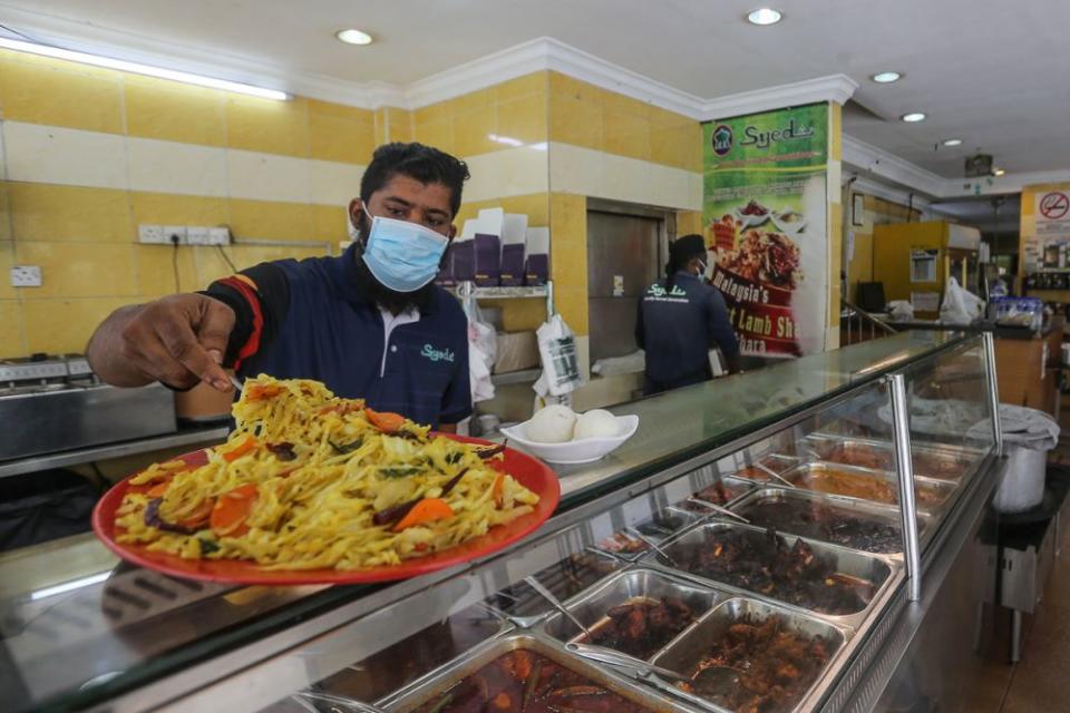 Kaw said food operators were struggling to cope as prices of poultry had increased by 20 per cent, as well as a 35 per cent additional cost for non-food materials. — Picture by Yusof Mat Isa