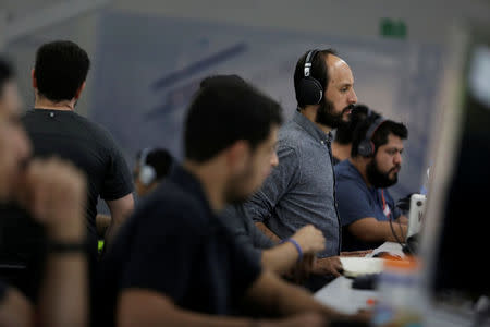 Employees of San Francisco-based software company Wizeline, work at the company's offices in Guadalajara, Mexico October 5, 2017. Picture taken October 5, 2017. REUTERS/Daniel Becerril