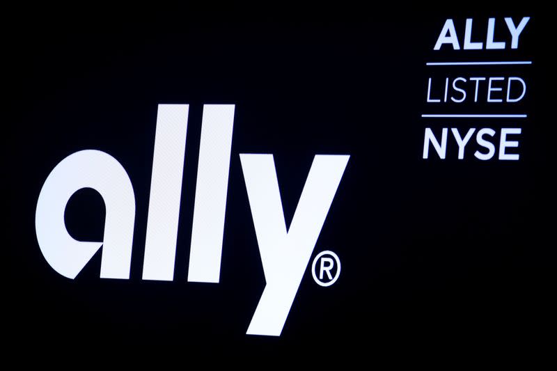 The logo and trading information for Ally Financial Inc appear on a screen on the floor at the NYSE in New York