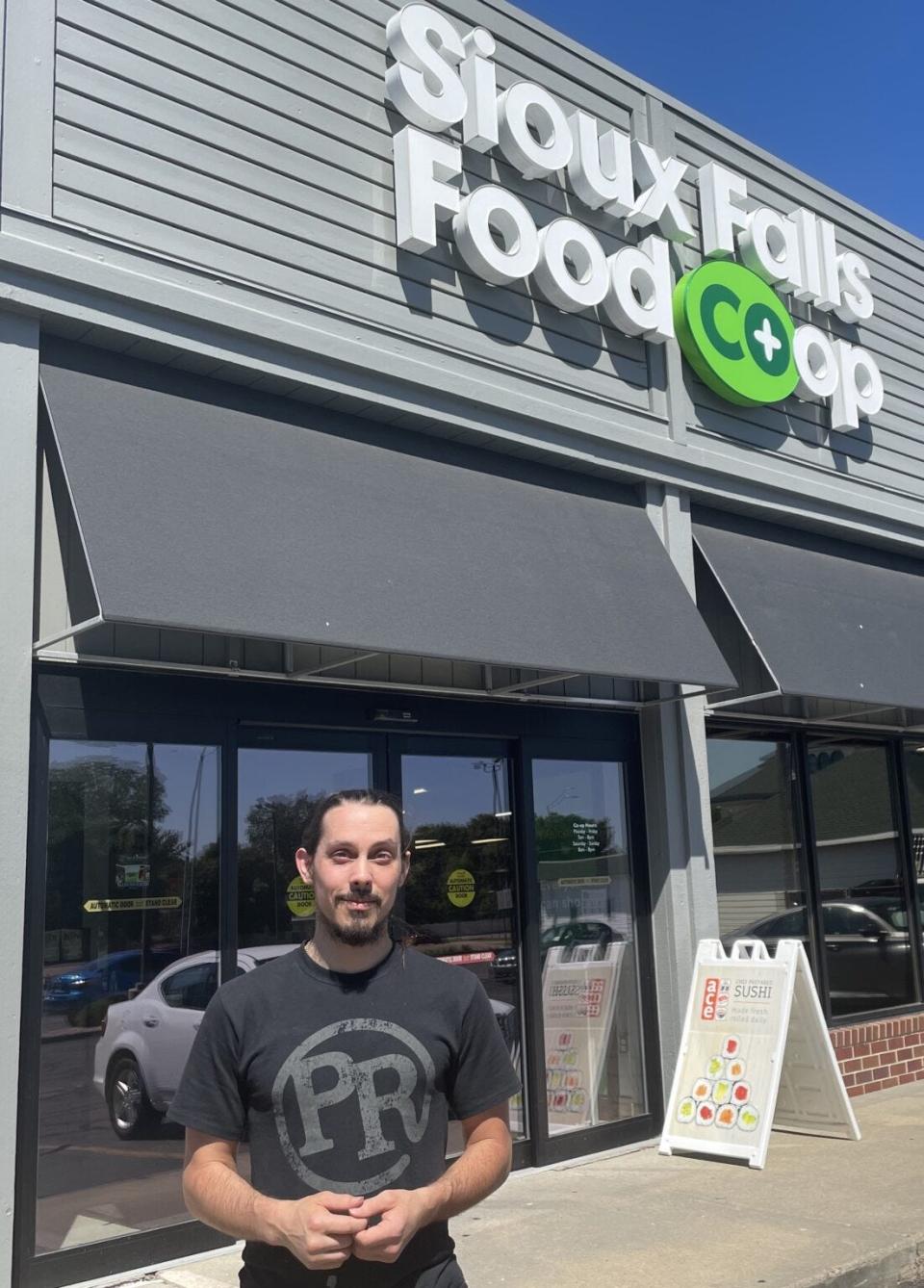 Trey Wharton of Sioux Falls has made many financial sacrifices in order to afford to buy organic foods that are part of his vegan diet.