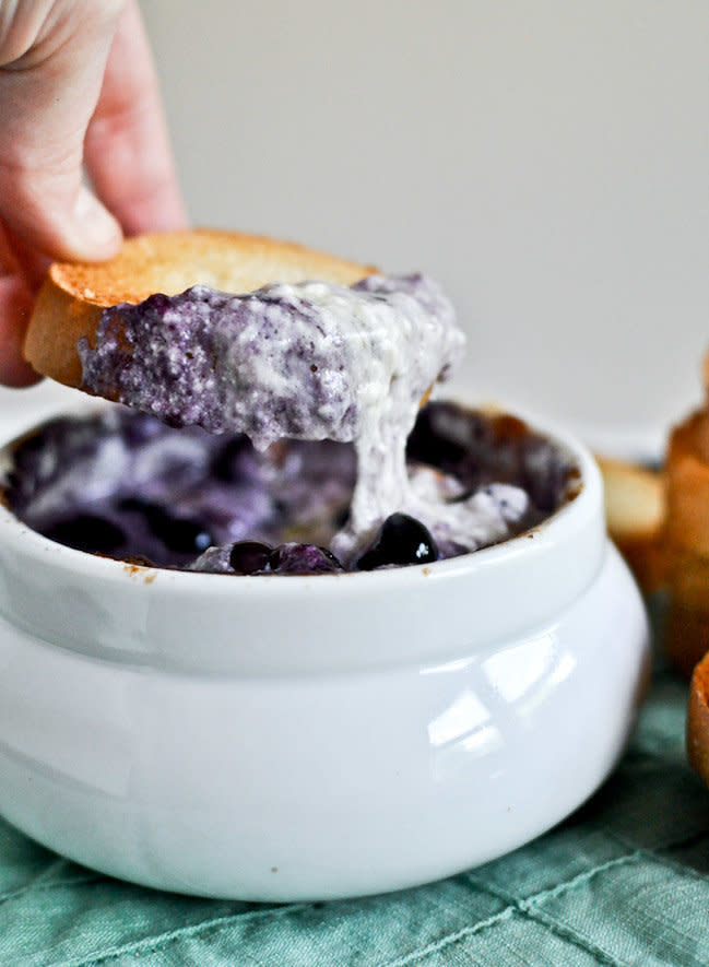 <strong>Get the <a href="http://www.howsweeteats.com/2012/07/hot-blueberry-cheddar-dip-with-toasty-bread/" target="_blank">Hot Blueberry Cheddar Dip with Toasty Bread recipe</a> from How Sweet It Is</strong>