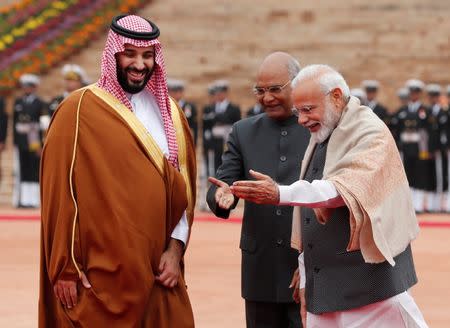 Saudi Arabia's Crown Prince Mohammed bin Salman is welcomed by India's Prime Minister Narendra Modi and President Ram Nath Kovind during his ceremonial reception at the forecourt of Rashtrapati Bhavan in New Delhi, India, February 20, 2019. REUTERS/Adnan Abidi