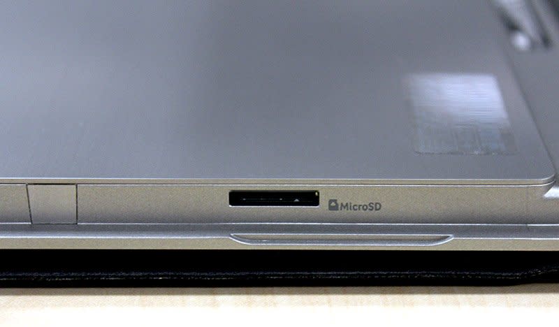 The Switch Alpha 12's microSD carder reader is hidden on the side behind the integrated kickstand.