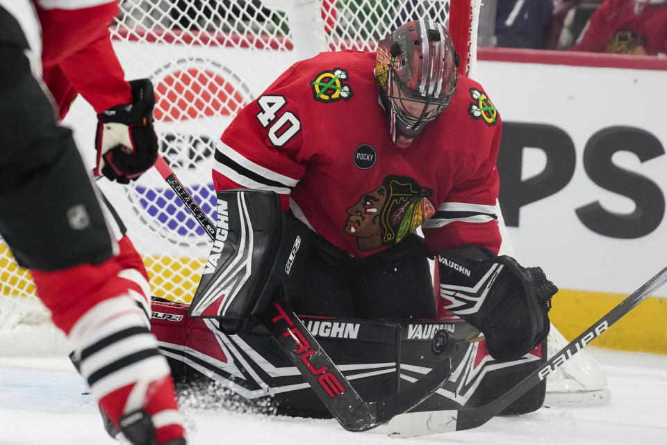 Chicago Blackhawks goaltender Arvid Soderblom blocks a shot during the first period of an NHL hockey game against the Toronto Maple Leafs, Friday, Nov. 24, 2023, in Chicago. (AP Photo/Erin Hooley)
