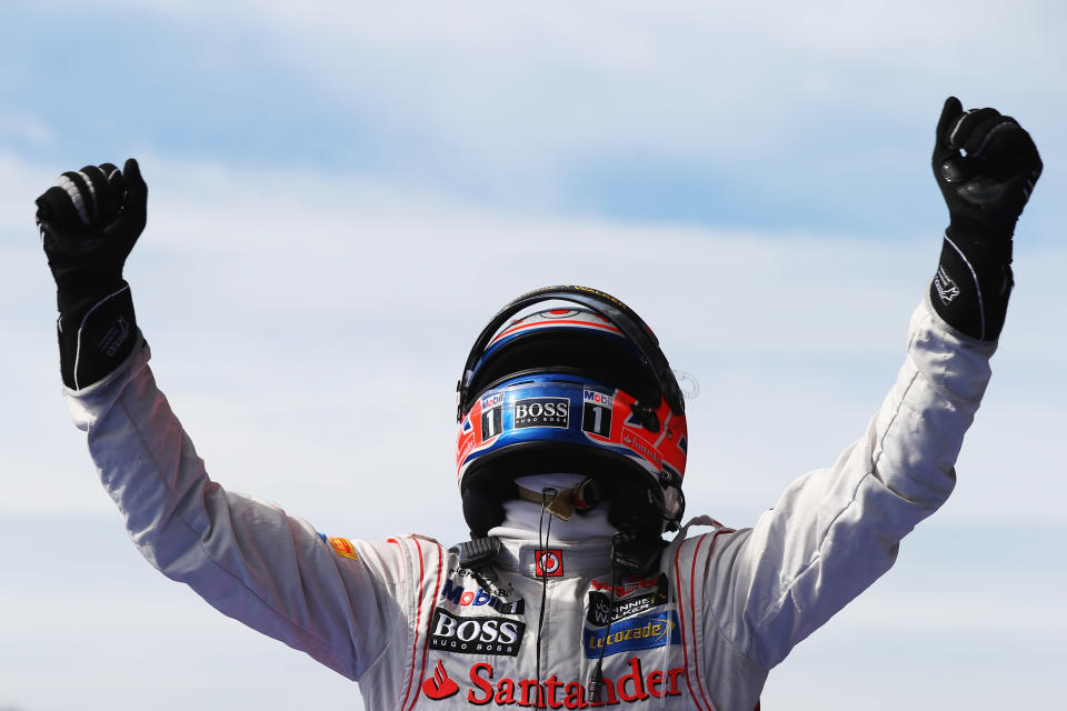 SPA, BELGIUM - SEPTEMBER 02: Jenson Button of Great Britain and McLaren celebrates in parc ferme after winning the Belgian Grand Prix at the Circuit of Spa Francorchamps on September 2, 2012 in Spa Francorchamps, Belgium. (Photo by Mark Thompson/Getty Images)