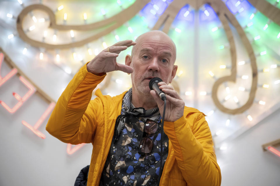 Lead vocalist of R.E.M. Michael Stipe, speaks during press conference for the presentation of his first museum exhibition, in Milan, Italy, Monday, Dec. 11, 2023. The show, entitled “I have lost and I have been lost but for now I’m flying high,” will be on view from Dec. 12, 2023 to March 16, 2024 at at Fondazione ICA Milano. (Claudio Furlan/LaPresse via AP)