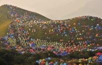 RNPS - PICTURES OF THE YEAR 2013 - Numerous tents are seen during the 2013 International I Camping Festival in Mount Wugongshan of Pingxiang, Jiangxi province, September 14, 2013. The event which opened on September 14 attracted more than 15,000 campers all over the world, according to Xinhua News Agency. REUTERS/Stringer (CHINA - Tags: SOCIETY ANNIVERSARY) CHINA OUT. NO COMMERCIAL OR EDITORIAL SALES IN CHINA