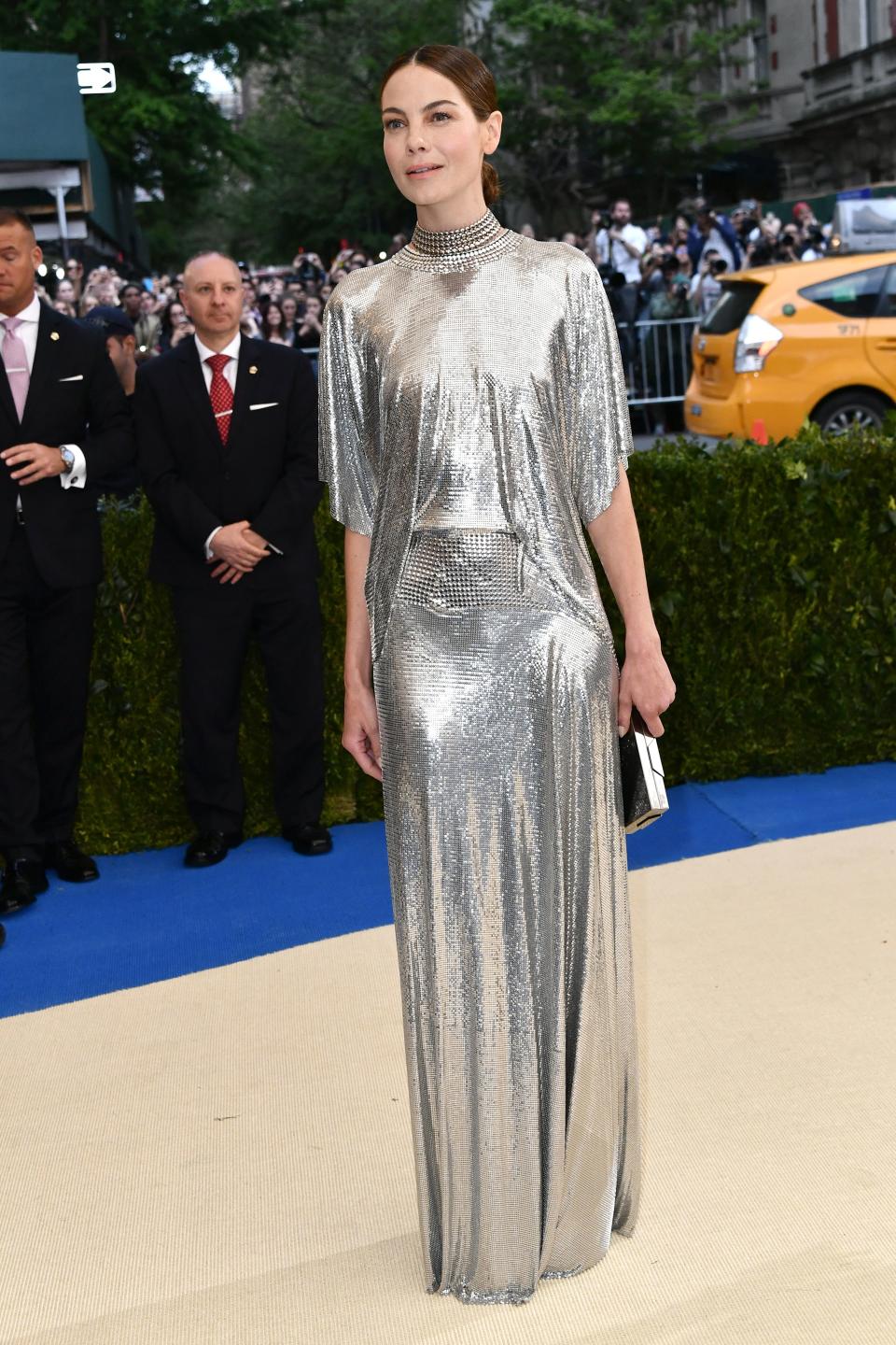 <h1 class="title">Michelle Monaghan in Paco Rabanne, Lee Savage clutch, and Cartier jewelry</h1><cite class="credit">Photo: Shutterstock</cite>