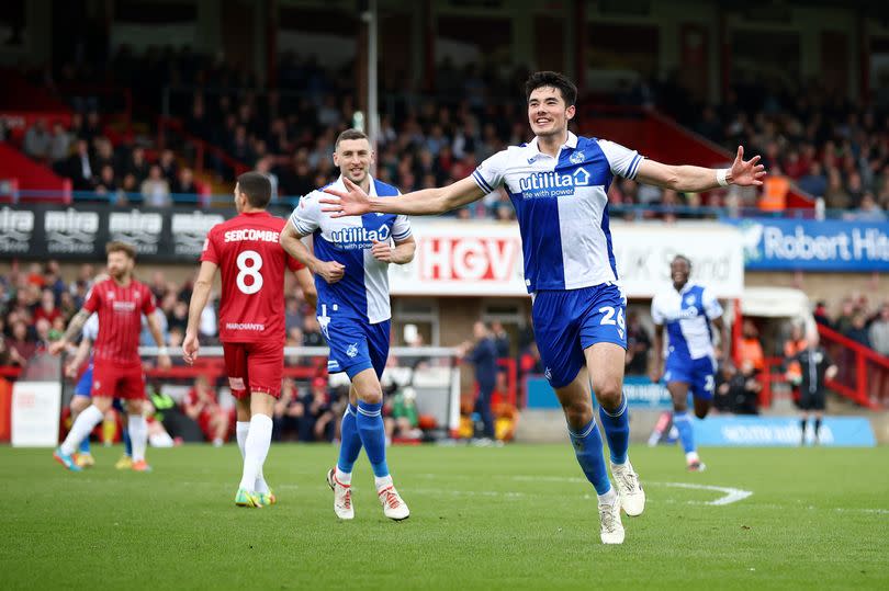 Elkan Baggott celebrates scoring Bristol Rovers' third goal at Cheltenham Town -Credit:Wil Cooper/EFL