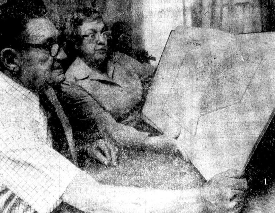 William T. and May Howard examine a map of Lee’s Summit