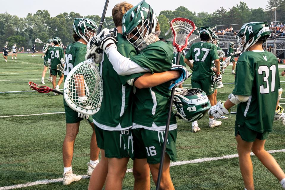 Ridge players hug each other before the game. Chatham hosts Ridge in the NJSIAA Group 3 North boys lacrosse final on Tuesday, June 6, 2023. 