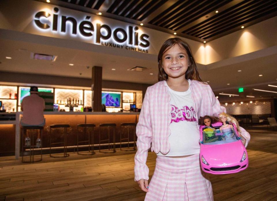 Mila Boucher, 9, poses inside Cinépolis Coconut Grove before seeing the Barbie movie in Miami, Fla., on Sunday, July 23, 2023.