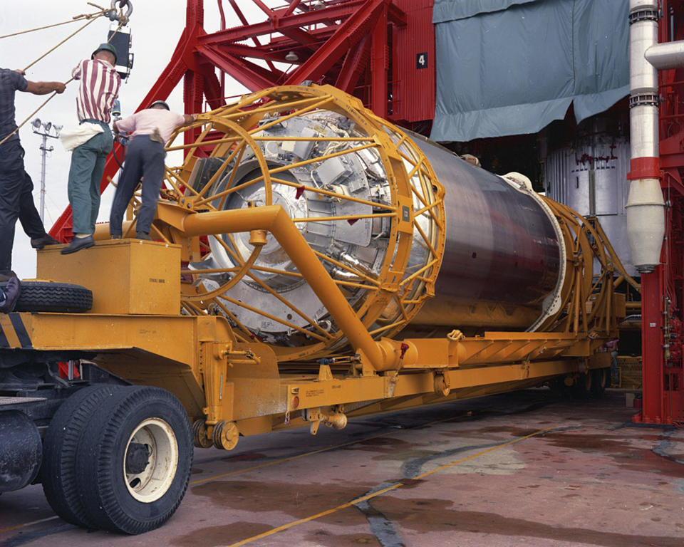 In this Aug. 13, 1965 photo provided by the San Diego Air and Space Museum, technicians work on an Atlas Centaur 7 rocket at Cape Canaveral, Fla. NASA's leading asteroid expert, Paul Chodas, speculates that asteroid 2020 SO, as it is formally known, is actually a Centaur upper rocket stage that propelled NASA’s Surveyor 2 lander to the moon in 1966 before it was discarded. (Convair/General Dynamics Astronautics Atlas Negative Collection/San Diego Air and Space Museum via AP)