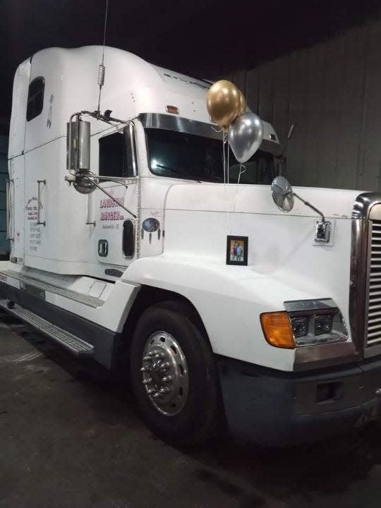 "Baby Girl," Jackie Gardner's nickname for her white 1996 FLD Freightliner, has a double-bunk sleeper and a skylight.