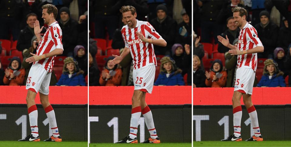 A combination photo shows Stoke City's English striker Peter Crouch do his "robot" celebration as he celebrates scoring his team's first goal, and his 100th Premiere League goal, during the English Premier League football match between Stoke City and Everton at the Bet365 Stadium in Stoke-on-Trent, central England on February 1, 2017. / AFP PHOTO / Paul ELLIS / RESTRICTED TO EDITORIAL USE. No use with unauthorized audio, video, data, fixture lists, club/league logos or 'live' services. Online in-match use limited to 75 images, no video emulation. No use in betting, games or single club/league/player publications.  /         (Photo credit should read PAUL ELLIS/AFP via Getty Images)