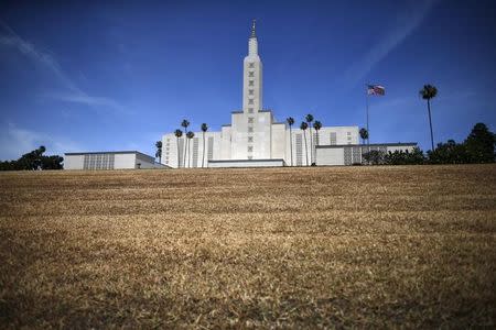 The Church of Jesus Christ of Latter-day Saints Mormon temple is seen with a brown lawn in Los Angeles, California, United States May 11, 2015. REUTERS/Lucy Nicholson/Files