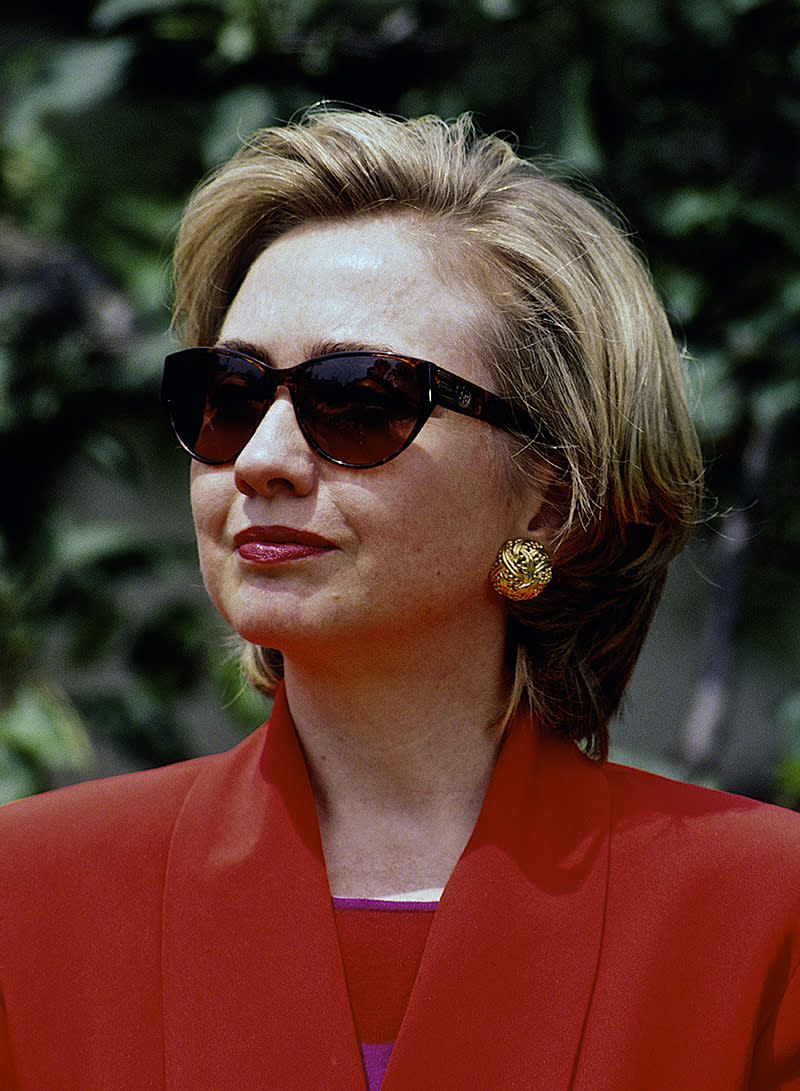 Hillary Clinton rocking some sunglasses with a red blazer in 1993