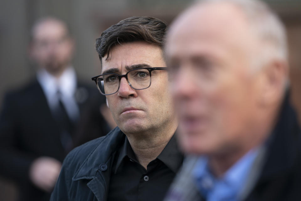 Greater Manchester mayor Andy Burnham looks on, outside Bridgewater Hall, following last-ditch talks with the Prime Minister aimed at securing additional financial support for his consent on new coronavirus restrictions, in Manchester, England, Tuesday, Oct. 20, 2020. The British government appeared poised Tuesday to impose strict coronavirus restrictions on England's second-largest city after talks with officials in Greater Manchester failed to reach an agreement on financial support for people whose livelihoods will be hit by the new measures (AP Photo/Jon Super)