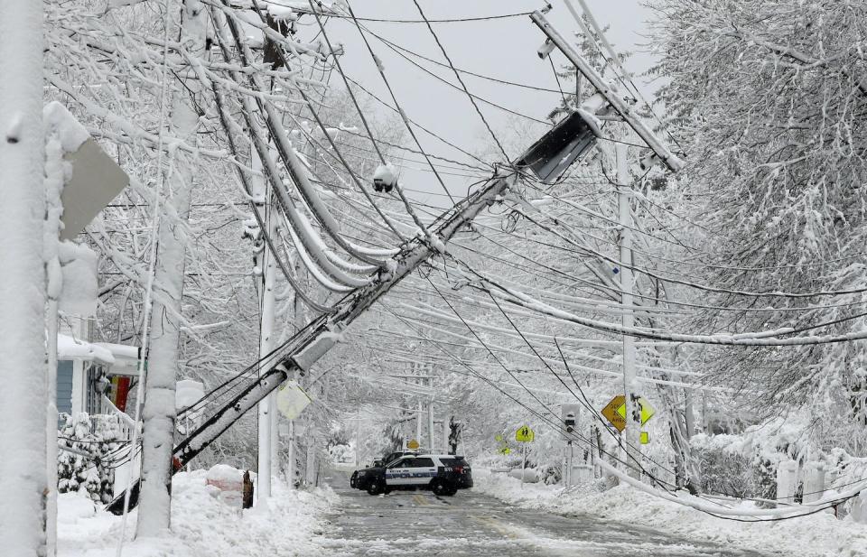 Ice storms like this one in the Northeast in 2018 can take down miles of power lines, causing blackouts. <a href="https://newsroom.ap.org/detail/NortheastStorm/177f72669ed14f50b91ae0bb363444e6/photo" rel="nofollow noopener" target="_blank" data-ylk="slk:AP Photo/Steven Senne;elm:context_link;itc:0;sec:content-canvas" class="link ">AP Photo/Steven Senne</a>
